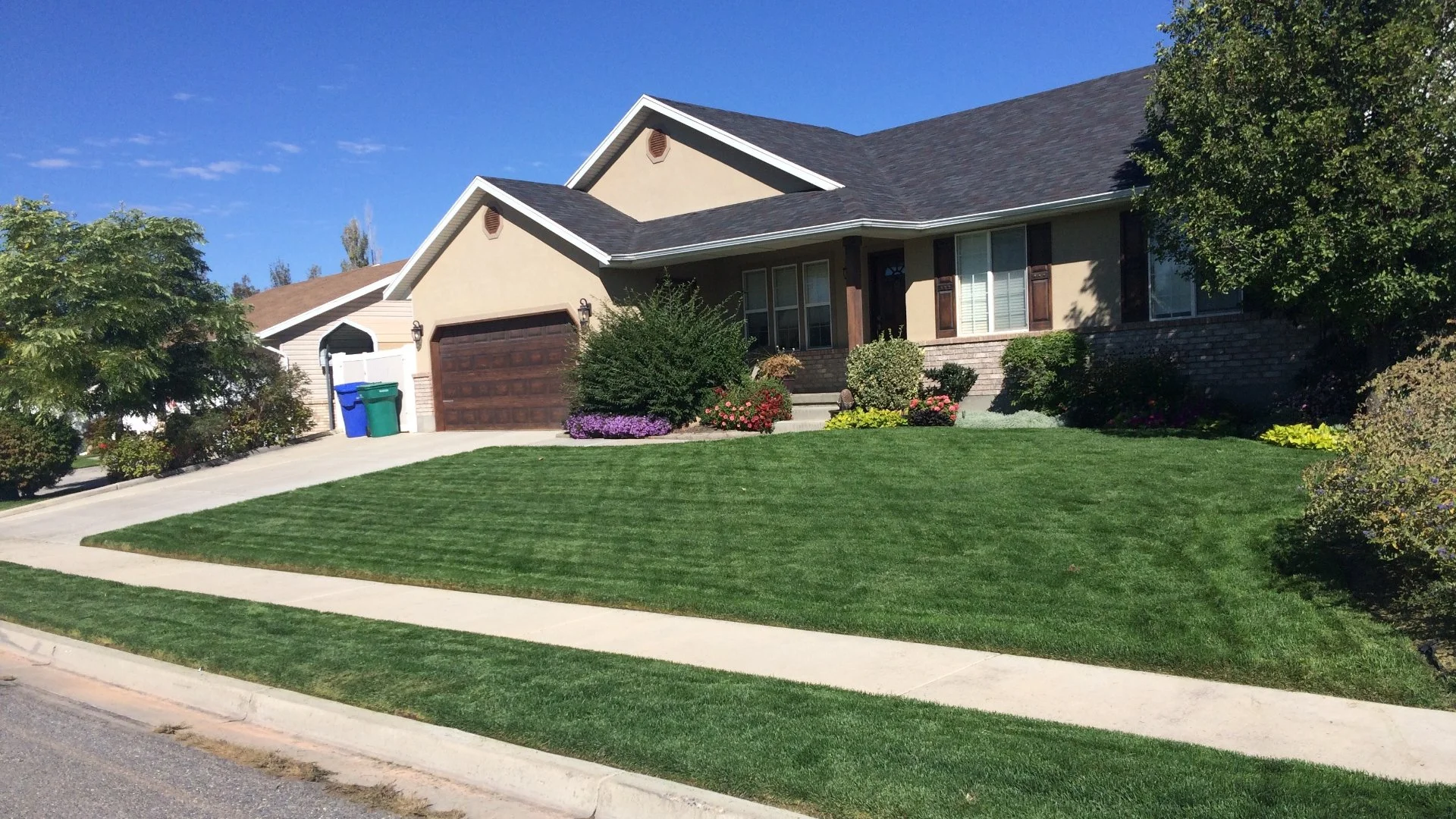 Thick, green lawn in front of our customer's home in Herber City, UT.